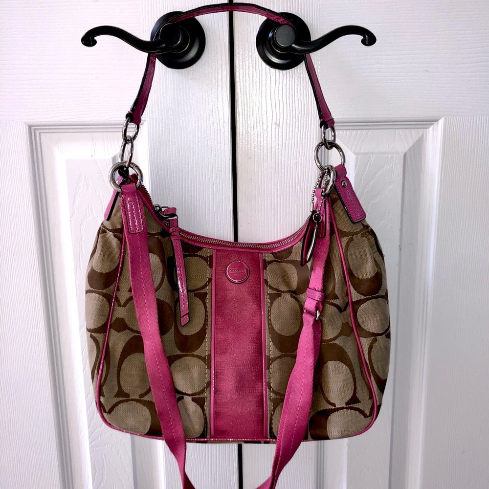 Coach bag. 13 x 9. Silver hardware. Signature “C” Logo pattern with pink accents